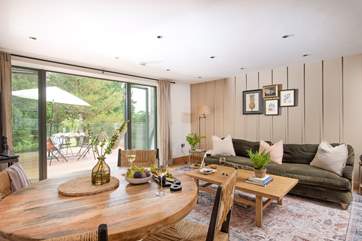 On warmer days, open the patio doors to welcome a gentle breeze through the linen drapes and invite the outside in.