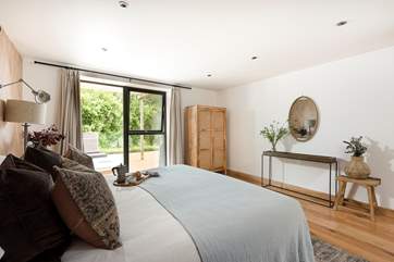 The hot-tub is right outside the bedroom doors