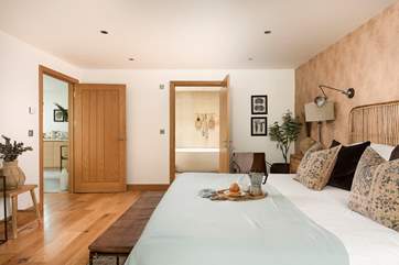 The main bedroom with en suite shower-room has a wonderfully-comfy super king-size bed swathed in beautiful bedding - the perfect spot for breakfast in bed.