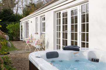 French doors lead out from the bedroom to the hot tub so you can just pop out and jump in!