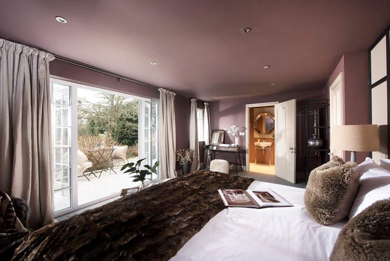 The main bedroom oozes tranquility and luxury. 