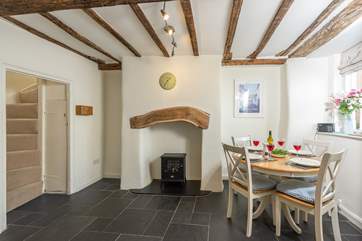 The Kitchen/diner looks out over the cobbles courtyard to the front of the Cottage.