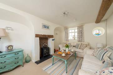 There is a really comfortable living-room with a wood-burner effect electric stove to give extra warmth out-of-season.