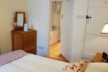 The master en suite is larger than average with a shower over the bath, the other door takes you out on to the landing.