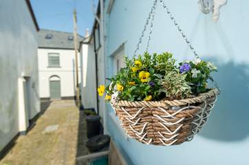 Many of the cottages along the little lane are painted in cheerful colours - there is a wonderful holiday feel here.