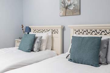 The pretty twin bedroom.