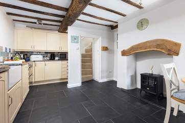 The slate floor of the kitchen/dining-room adds to the traditional feel but is also great for dogs after a walk along the beach.