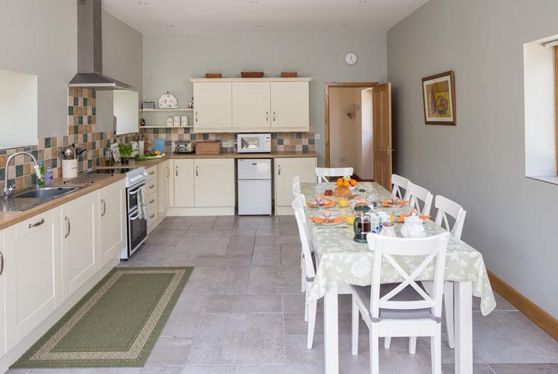 The kitchen/dining-room is a very sociable space for all the family.
