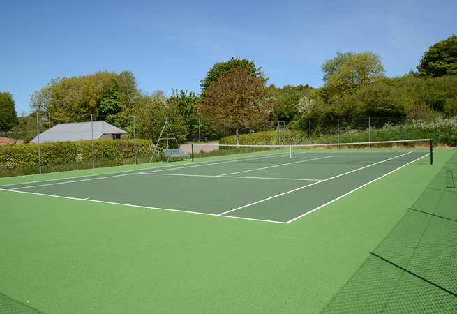This fabulous tennis court is a real bonus for the energetic. There is plenty of outside space, offering a farm setting that children will be sure to remember. Do please supervise children at all times. 