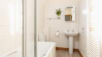 Upstairs you will find the family bathroom.