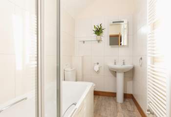 Upstairs you will find the family bathroom.