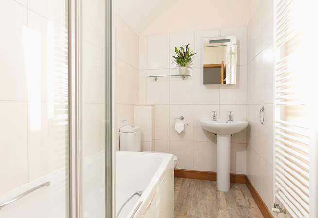 Upstairs you will find the family bathroom.