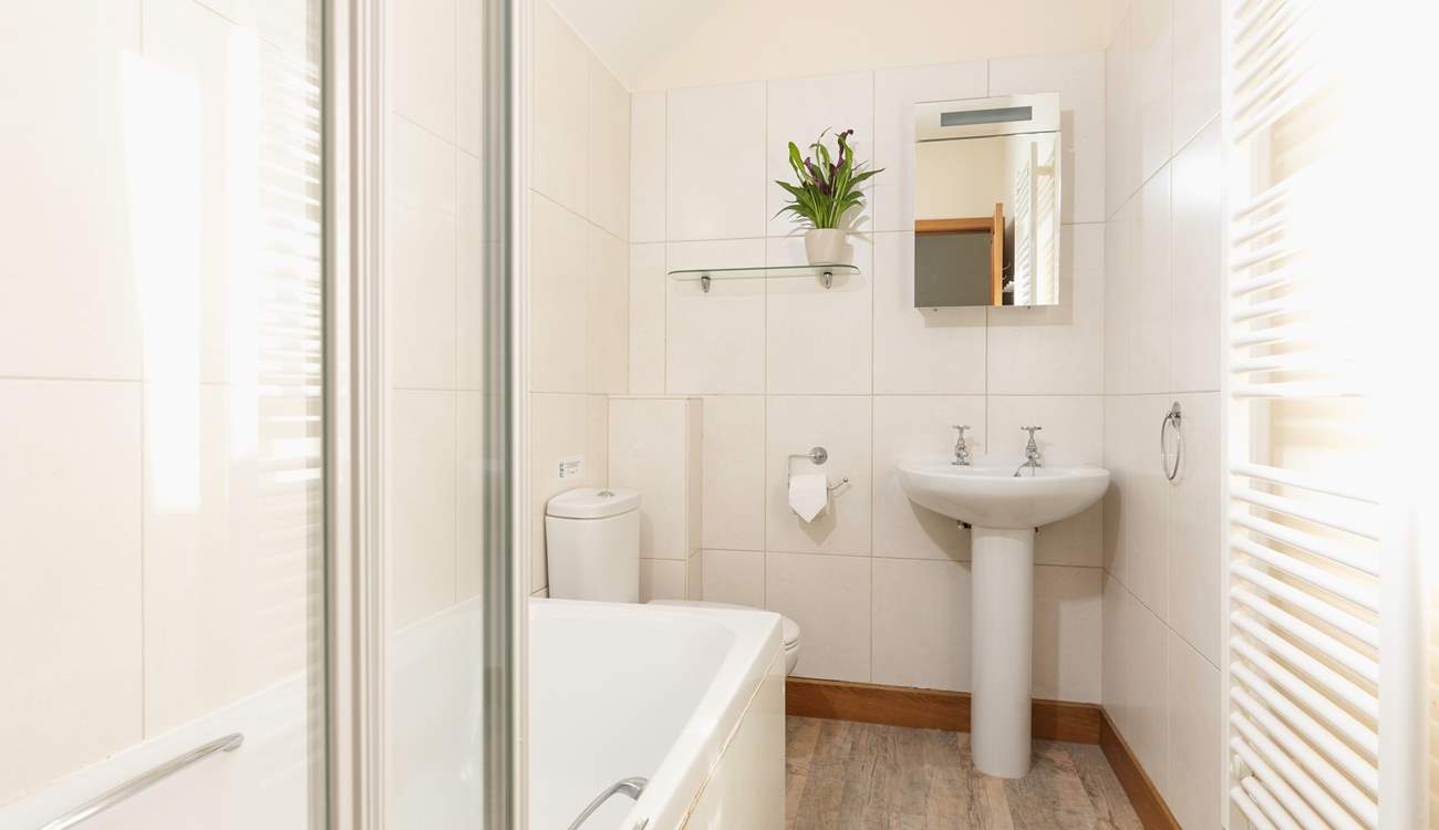 Upstairs you will find the family bathroom.