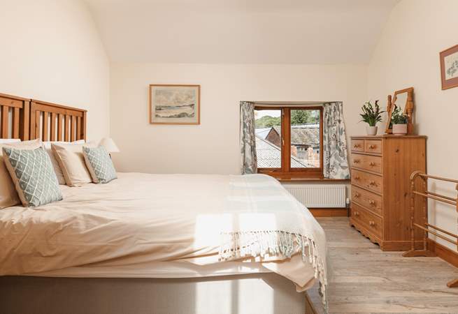 Relax in the main bedroom with sumptuous super-king bed, that can also be split in to two full size singles.