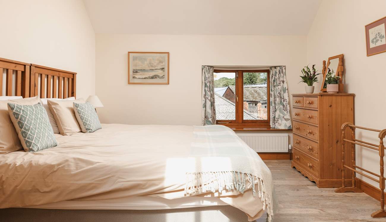 Relax in the main bedroom with sumptuous super-king bed, that can also be split in to two full size singles.