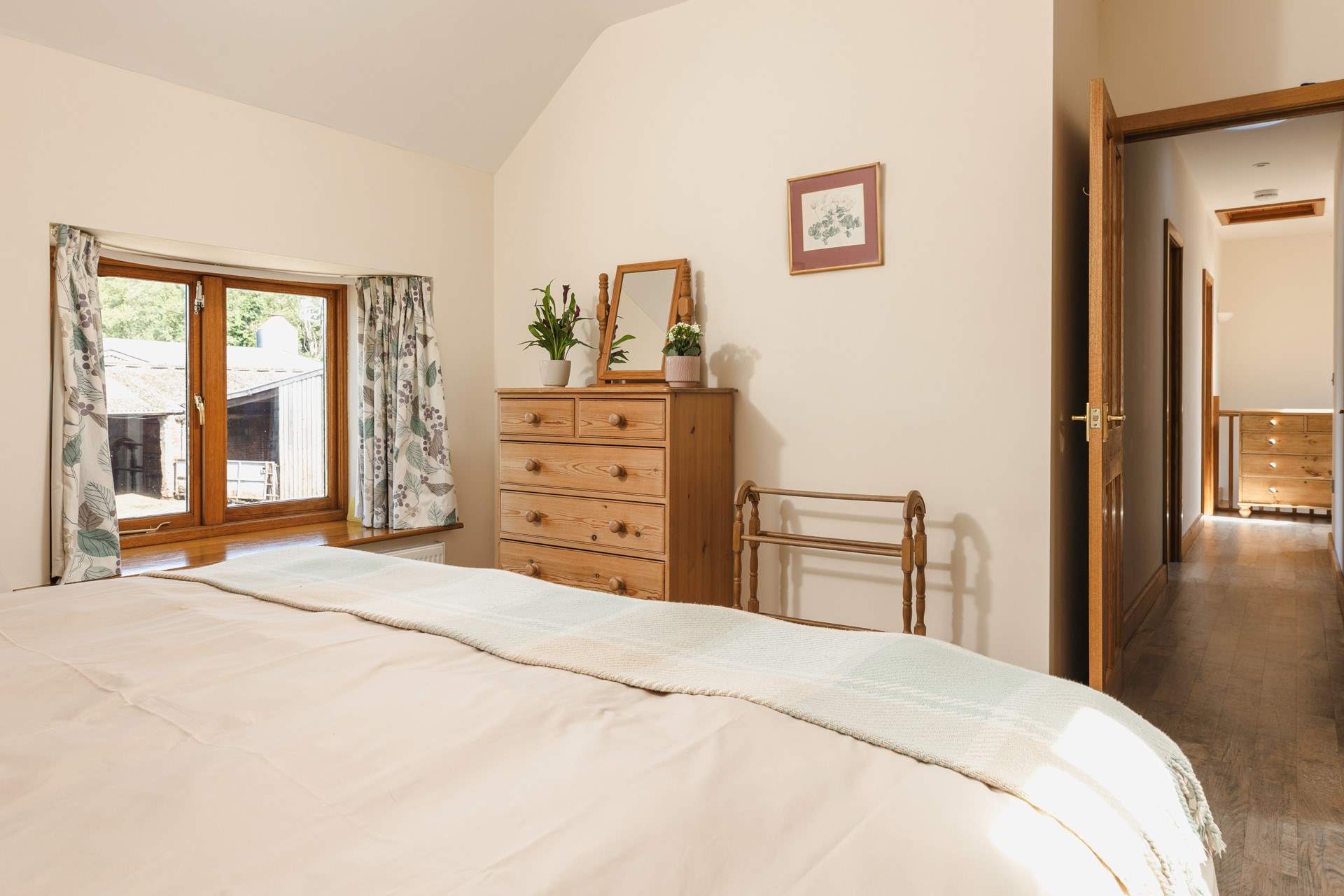 Calming tones in the main bedroom will help you to switch off.
