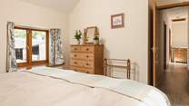 Calming tones in the main bedroom will help you to switch off.