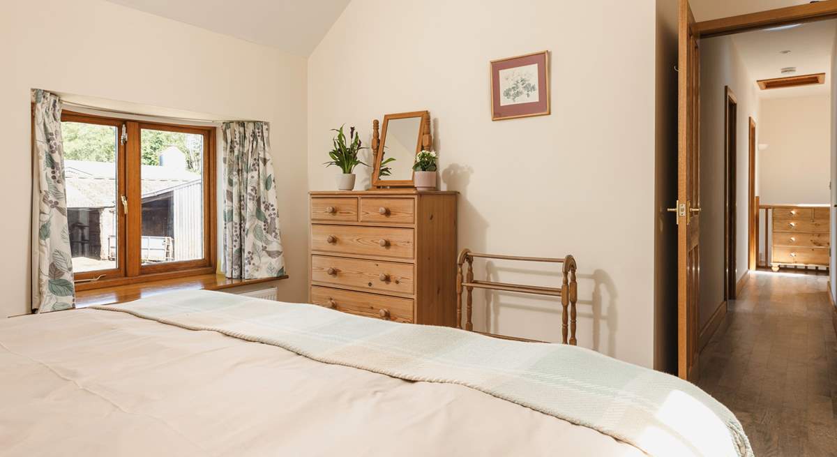 Calming tones in the main bedroom will help you to switch off.