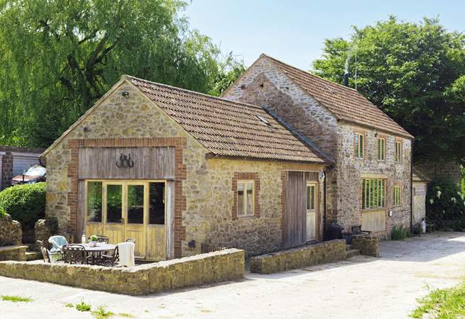 The unique farm setting will make for a memorable holiday. The livestock barns are opposite the cottage.