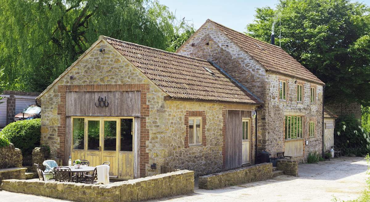 The unique farm setting will make for a memorable holiday. The livestock barns are opposite the cottage.