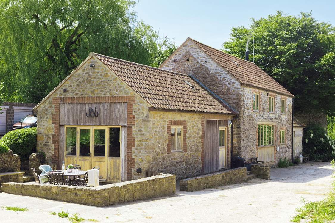 The unique farm setting will make for a memorable holiday. The livestock barns are opposite the cottage.