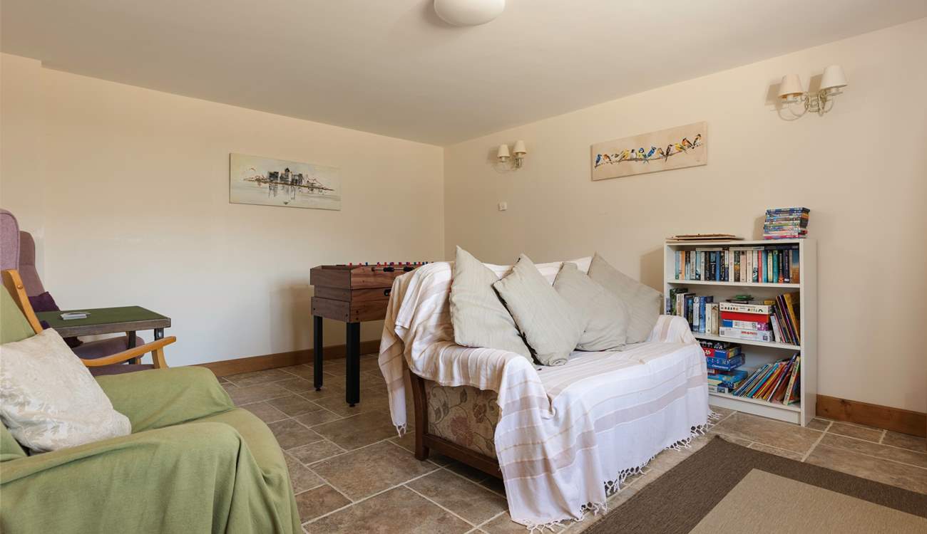 The playroom has lots of toys and books to keep children entertained.