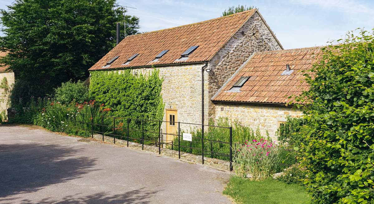 The rear of Sturthill Stable where you will park up and walk across the bridge that runs over a little stream, idyllic! 