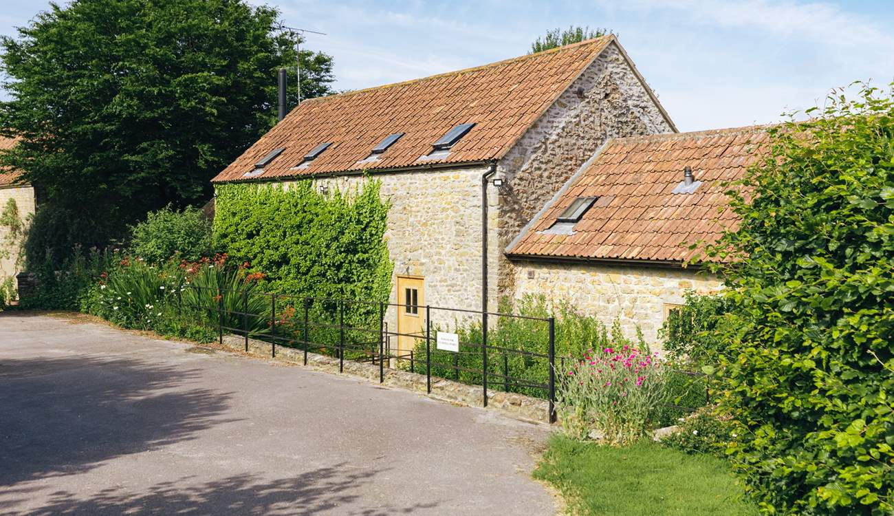 The rear of Sturthill Stable where you will park up and walk across the bridge that runs over a little stream, idyllic! 