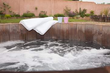 End the day with a dip in the cedar hot tub.