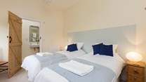 This is the fourth of the first floor bedrooms (bedroom 5), with views over the fields at the back of the barn.