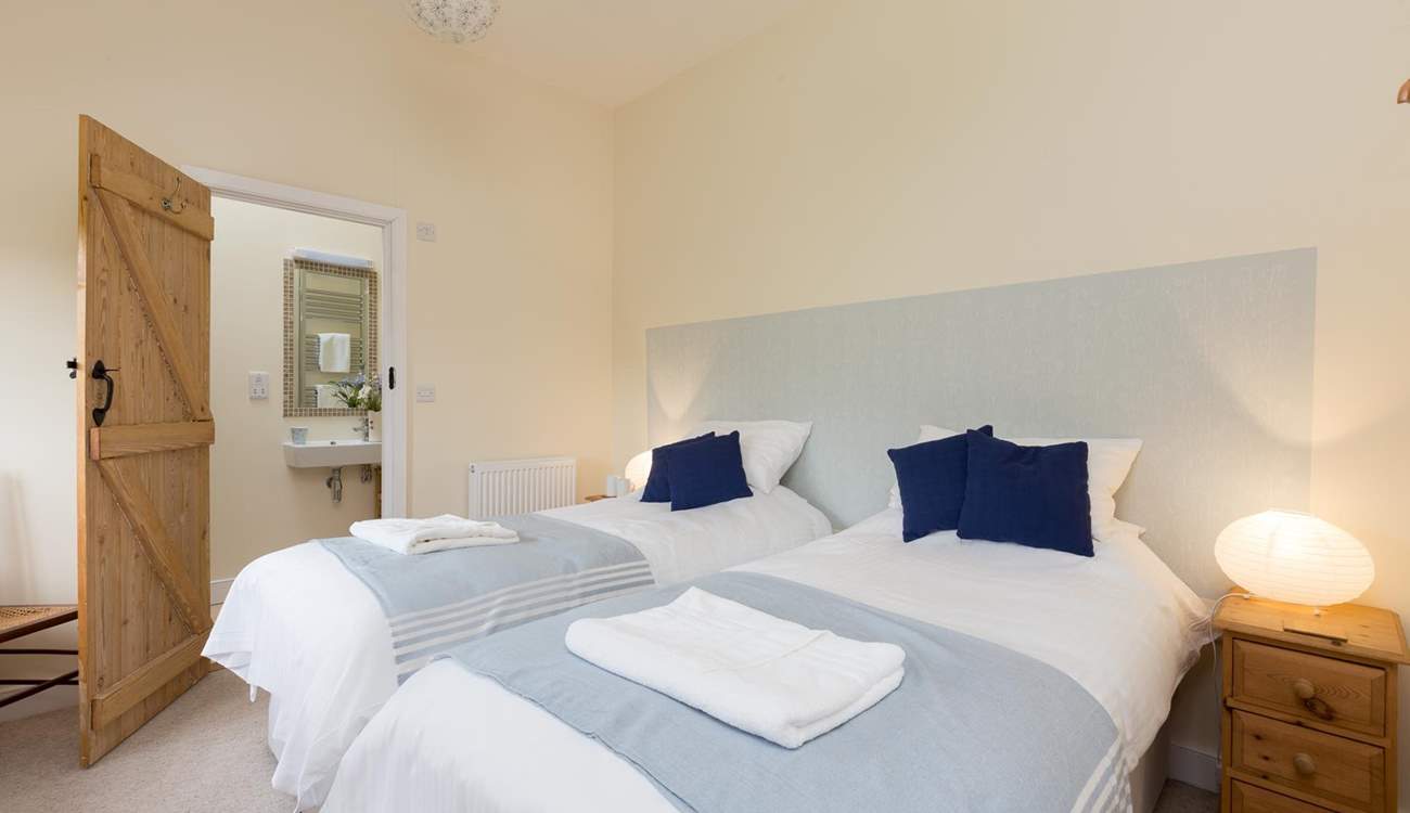 This is the fourth of the first floor bedrooms (Bedroom 5), with views over the fields at the back of the barn.