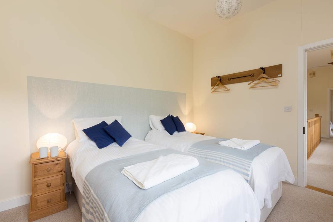 This photo shows the bed made up as twins.