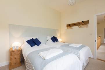 This photo shows the bed made up as twins.