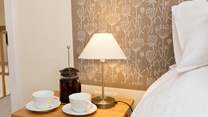 Each bedroom has a wonderful painted panel as its headboard.