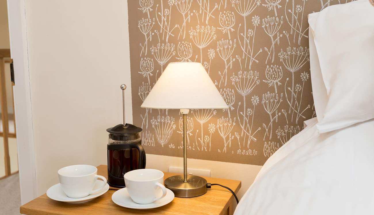 Each bedroom has a wonderful painted panel as its 'headboard'.