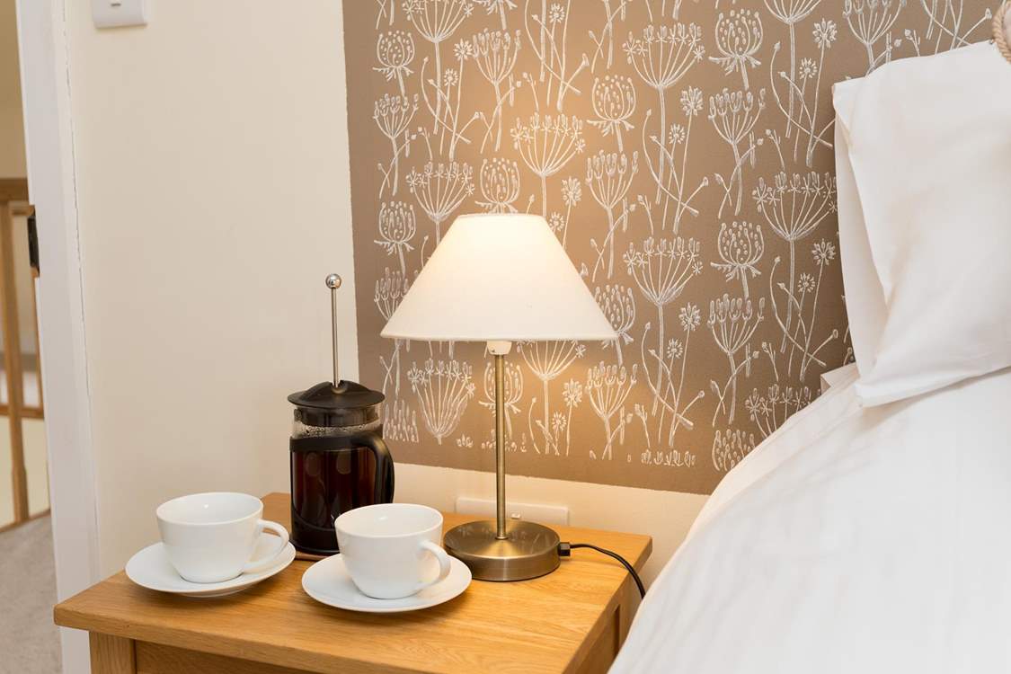 Each bedroom has a wonderful painted panel as its 'headboard'.