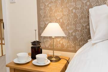 Each bedroom has a wonderful painted panel as its 'headboard'.