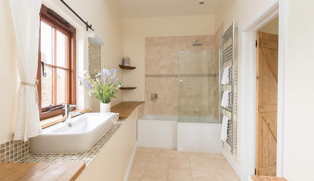 This bedroom also has a bath and fitted shower.