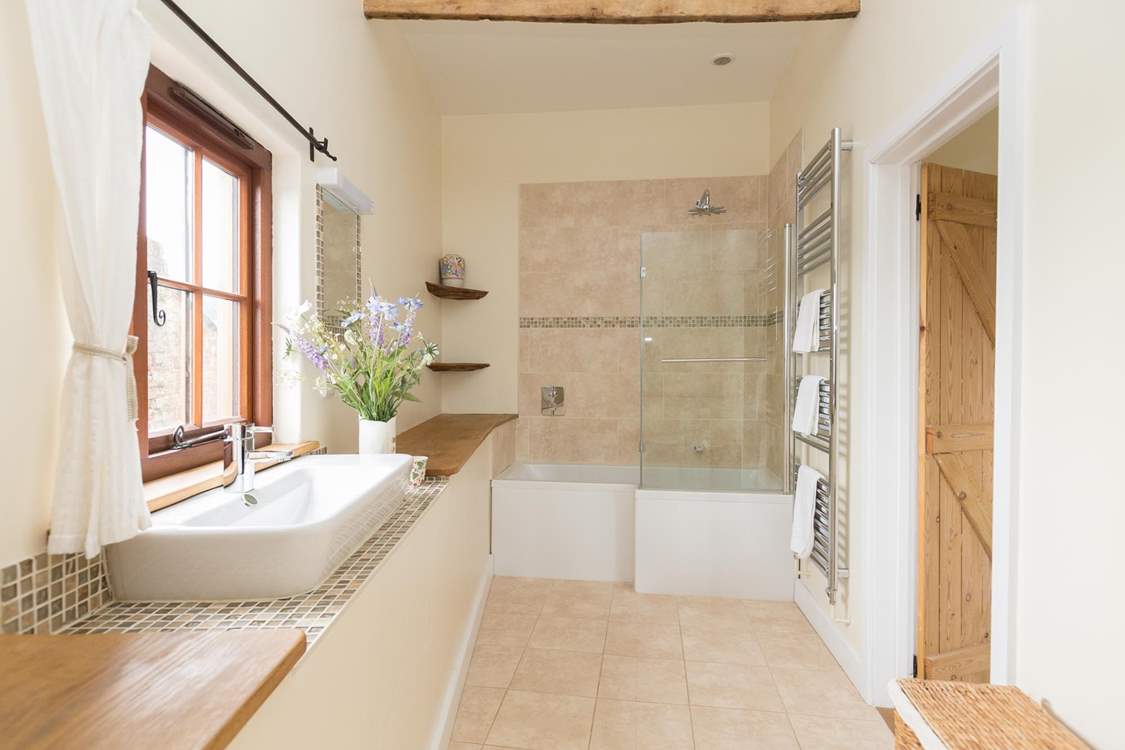 This bedroom also has a bath and fitted shower.