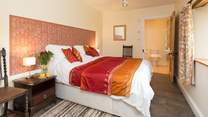This is the ground floor bedroom (bedroom 1), with its rich and welcoming colour theme.