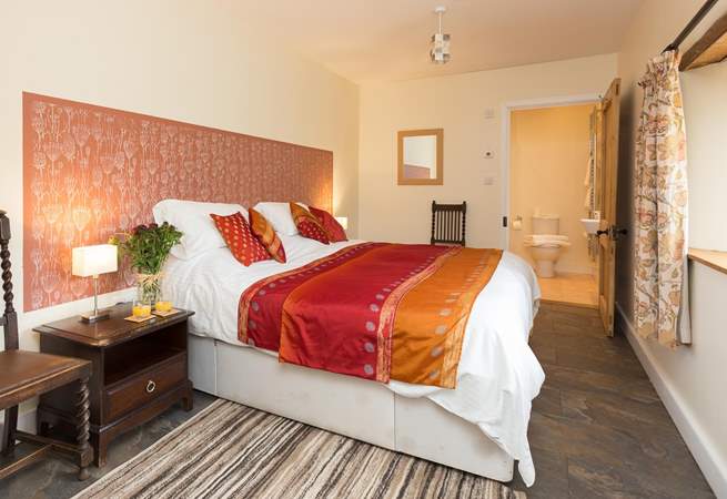 This is the ground floor bedroom, with its rich and welcoming colour theme.