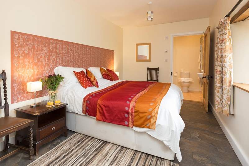 This is the ground floor bedroom, with its rich and welcoming colour theme.