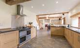 There is a superbly equipped kitchen which is open plan to the rest of the living-area so that it is all very sociable. - Thumbnail Image