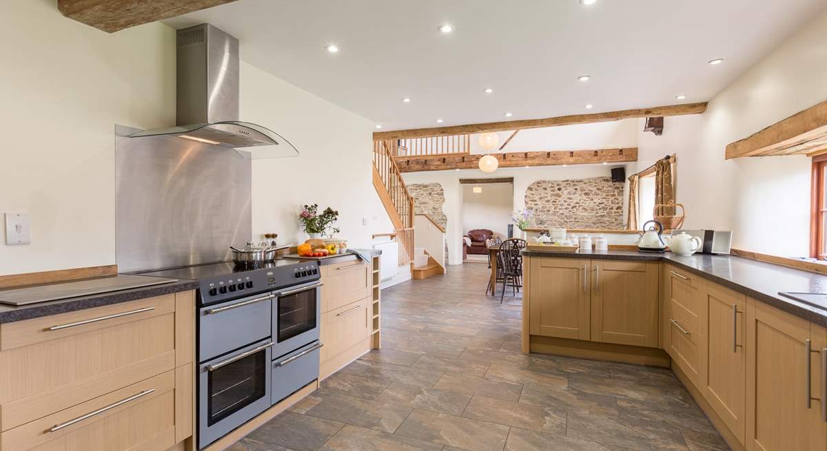 There is a superbly equipped kitchen which is open plan to the rest of the living-area so that it is all very sociable.