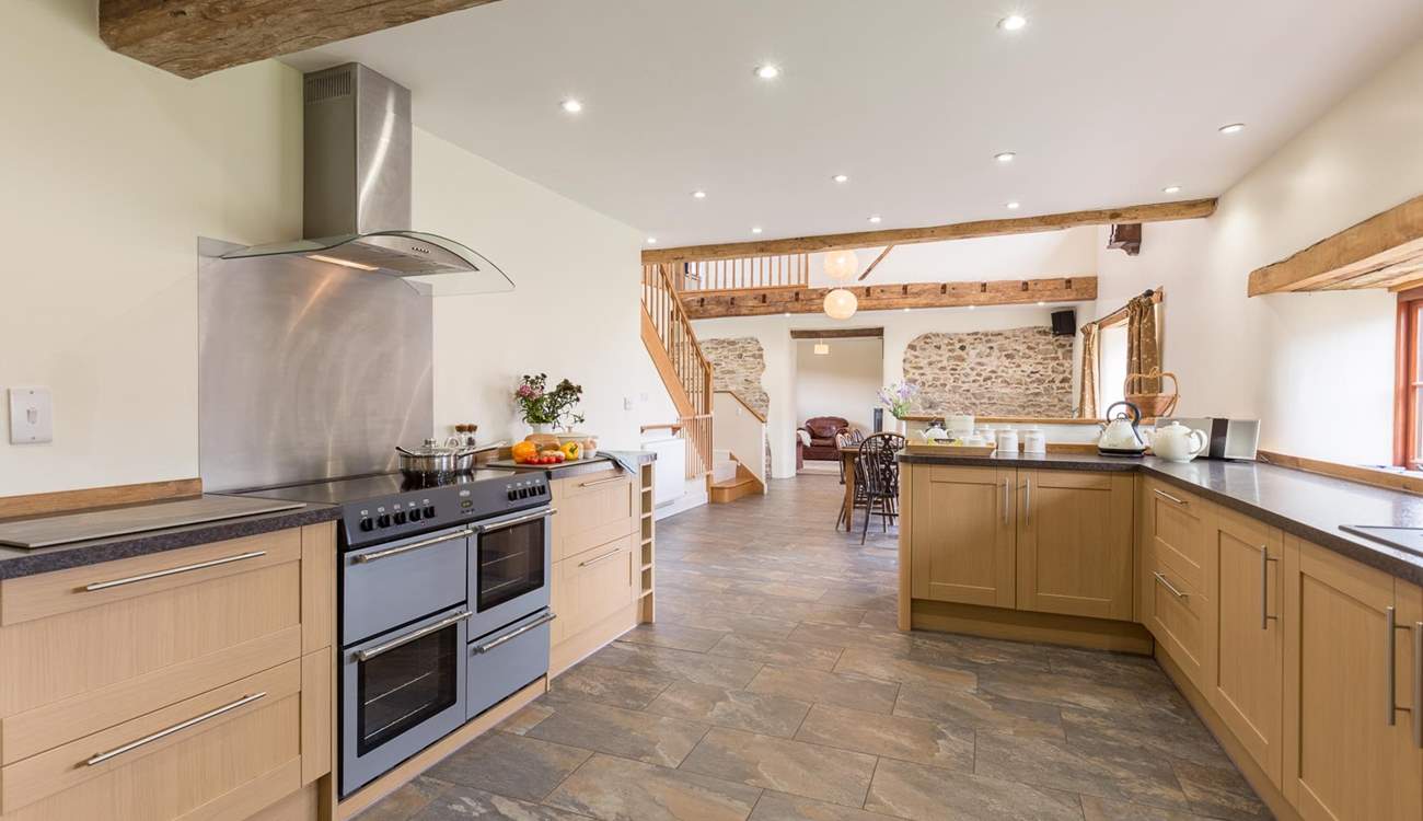 There is a superbly equipped kitchen, including a full-size fridge. The space is open plan to the rest of the living-area so very sociable.