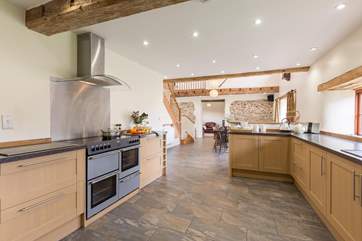 There is a superbly equipped kitchen which is open plan to the rest of the living-area so that it is all very sociable.