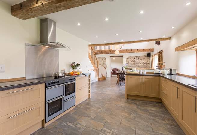 There is a superbly equipped kitchen which is open plan to the rest of the living-area so that it is all very sociable.