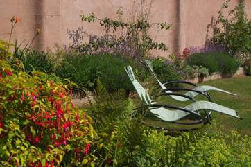 Just put your feet up and relax in this fabulous sunny garden.