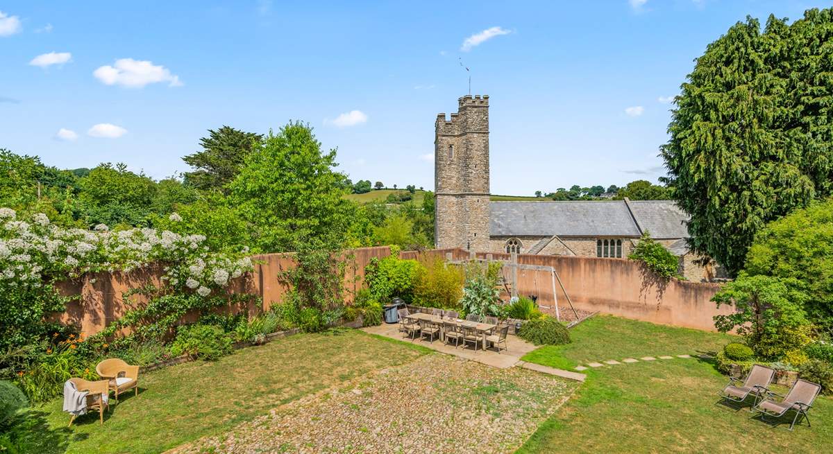 A view of the garden - with the pretty village church in the background.