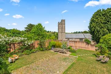 A view of the garden - with the pretty village church in the background.
